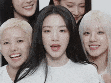 a group of young women are posing for a picture