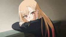 a girl with long blonde hair and red eyes