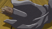 a cartoon of a person laying on the floor with a broken leg