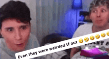 two men are sitting next to each other with a caption that says even they were weirded tf out