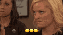 a woman with three smiley faces around her face