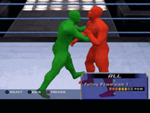 a video game screen shows a green and red wrestler fighting
