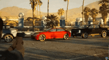 a video game scene with a red car and a black truck