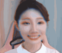 a blurry picture of a woman 's face with a hand on it
