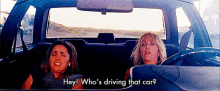 Whos Driving That Car Bridesmaids GIF - Whos Driving That Car Bridesmaids Hiding GIFs
