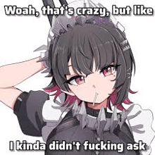 a girl in a maid outfit with spikes on her head is making a face .