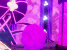 a purple and pink background with a purple object in the foreground and a purple object in the background .