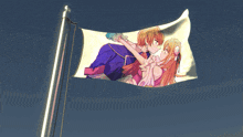 a flag with a picture of a boy and girl kissing on it