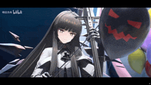 a girl with long black hair is holding a cello and a balloon with a pumpkin face on it