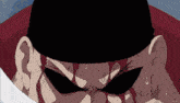 a close up of a person 's face with a black hat on