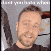 a man with a beard and blue eyes is smiling with the words " dont you hate when " above him