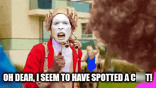 a man with white paint on his face says oh dear i seem to have spotted a c.