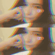 a pixelated image of a woman with hearts on her eyes