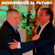 two men are shaking hands and the words bienvenidos al futuro are above them
