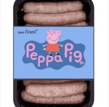 a tray of sausages with a peppa pig sticker on it