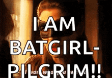 a poster with a woman wearing a mask and the words i am batgirl pilgrim .