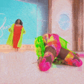 a woman in a green coat is standing in front of a sign that says shers