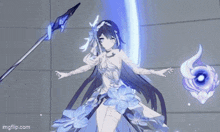 a girl in a white dress with blue flowers is holding a spear and a wand .
