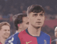 a close up of a soccer player 's face during a match .