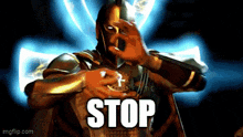 a man in armor is making a stop sign