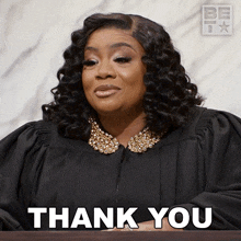 a woman in a judge 's gown says " thank you "