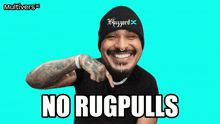 a man wearing a beanie and a black shirt with the words no rugpulls on it