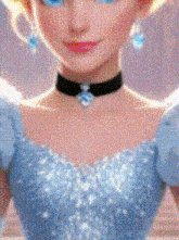 a close up of a cinderella doll wearing a blue dress and a choker .