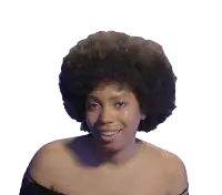 a woman with a large afro is smiling and wearing a black off the shoulder top