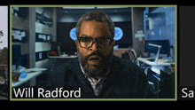 a man with glasses and the name will radford on his face