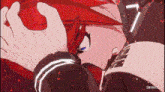 a close up of a person 's face with red hair and a sign that says okay