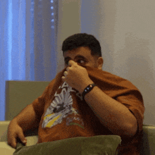 a man wearing a t-shirt that says ' eagles ' on it