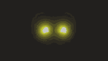a pair of yellow wings glowing in the dark