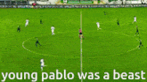 young pablo was a beast is written on the bottom of a soccer field