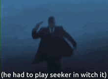 a man in a suit and tie is pointing his gun at his head with the words he had to play seeker in witch it