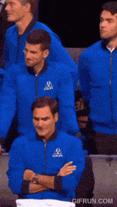 a group of men wearing blue jackets with europe written on them