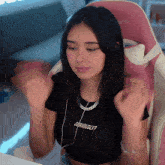 a girl wearing a shirt that says seriously on it