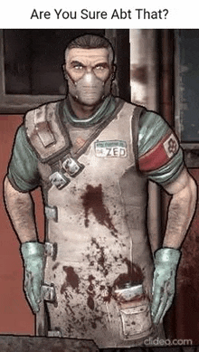 a man wearing a mask , apron , gloves and a name tag is standing in a room .