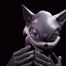 a close up of a sonic the hedgehog statue with blue eyes .