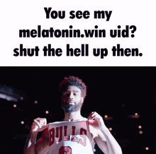 a man wearing a bulls jersey with the number 0 on the front