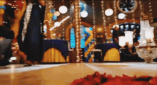 a blurry picture of a woman dancing in a room
