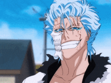 a man with blue hair is smiling with a skull on his face