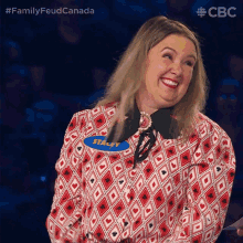a woman with a name tag that says staff