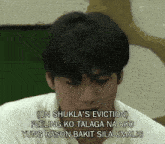 a picture of a man with a caption that says " on shukla 's eviction "