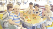 Jonghyun Waving GIF - Eating Restaurant Waving GIFs