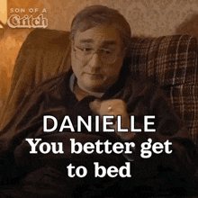 a man with glasses is sitting on a couch and says danielle you better get to bed .