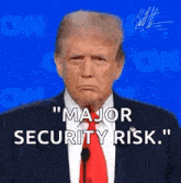 donald trump is giving a speech at a cnn debate and says `` major security risk . ''