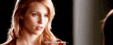 a woman is looking at herself in the mirror and says `` you look pretty '' .