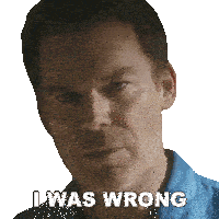 a man in a blue shirt has the words i was wrong written on his face