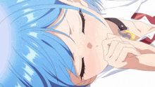 a girl with blue hair is laying down and covering her mouth with her hand