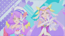 a couple of anime girls standing next to each other on a blue and purple background